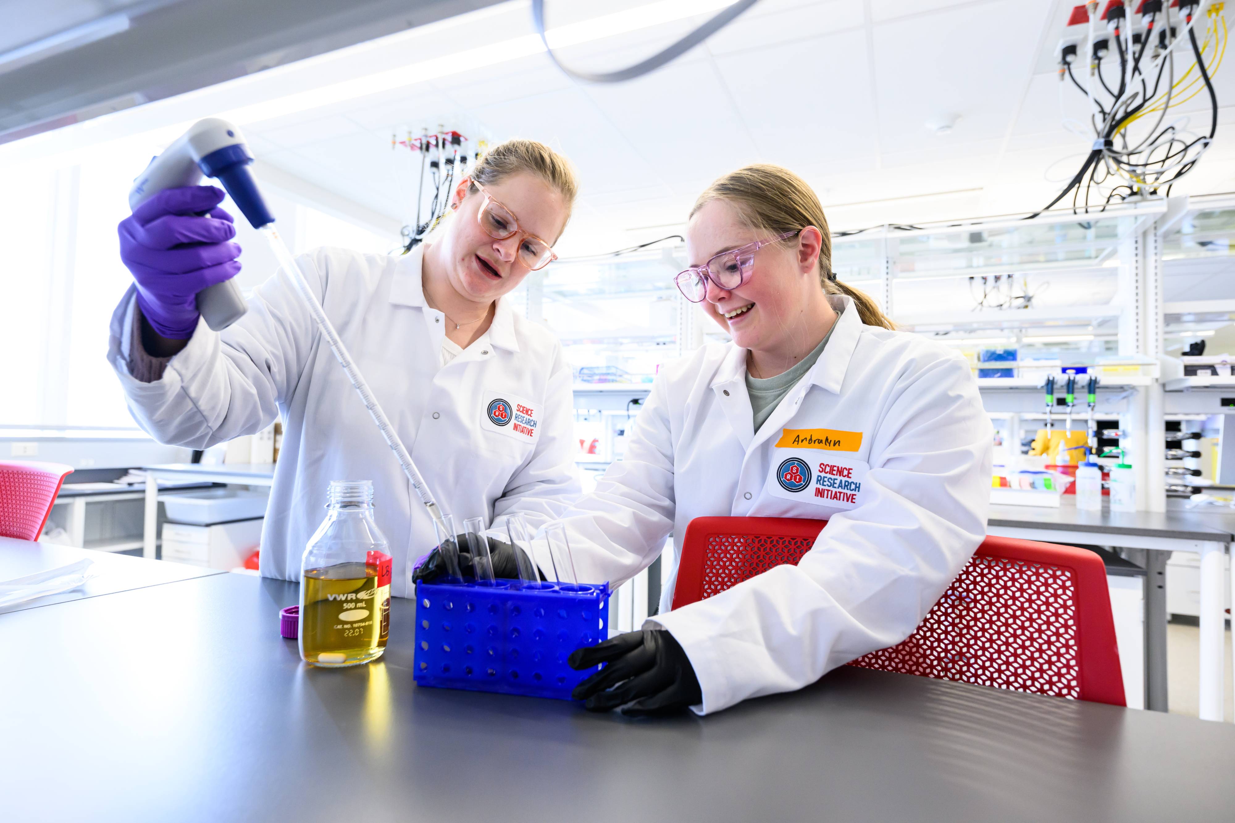 Two people in the science lab.